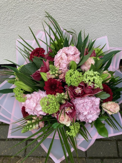 Simply the Best - One of our deluxe ranges of bouquets , Here we select only the best blooms for a stunning design of hydrangeas, lily's , orchids and roses, then complimenting with foliage and filler flowers. its gift wrapped for delivery or collection.