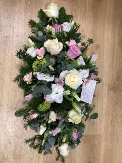 Pastel floral Spray - Seasonal pastel flowers designed into a beautiful floral spray.