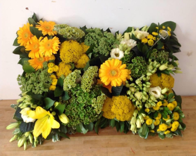 Textured Pillow Garden Design - Using a selection of flowers this design is grouped together to form a massed textured design, with depth and character. The design can be done in any colour on request.