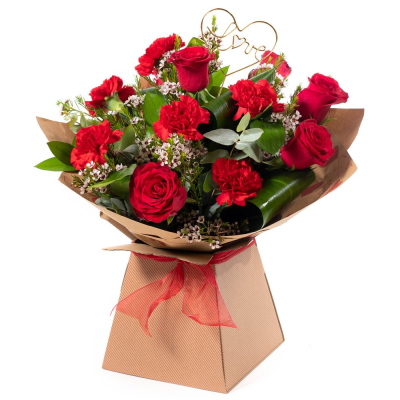 Red Smooch - Roses and carnations make the perfect couple in this timeless and romantic gift that's sure to impress. Send love today with same-day floral delivery.