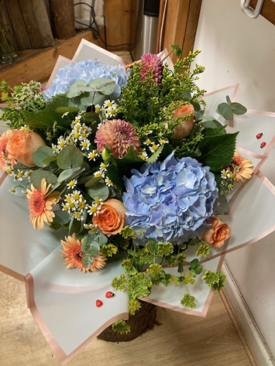 You Are The One That Want - Beautiful summer selection of soft delicate flowers in shades of blue cream peach and lemon We can deliver in and around Birmingham City Centre and the Jewellery Quarter This design is ideal for any occassion wedding gaduation or birthday