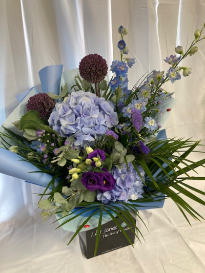 Into The Blue - A bespoke selection of flowers in shades of blue and purple with complimenting foliage great for any celebration